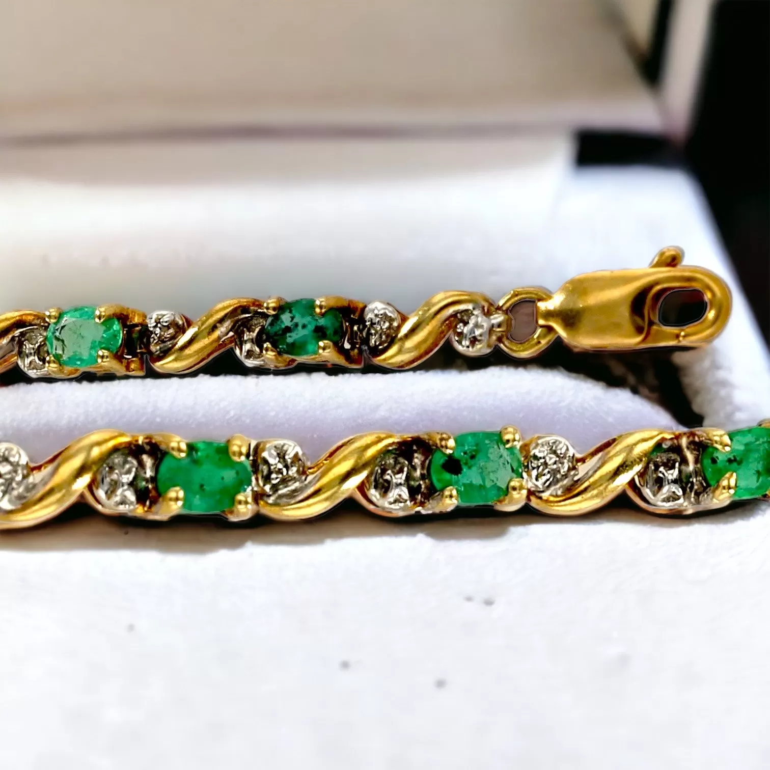 Gold 10k emerald and diamond tennis bracelet