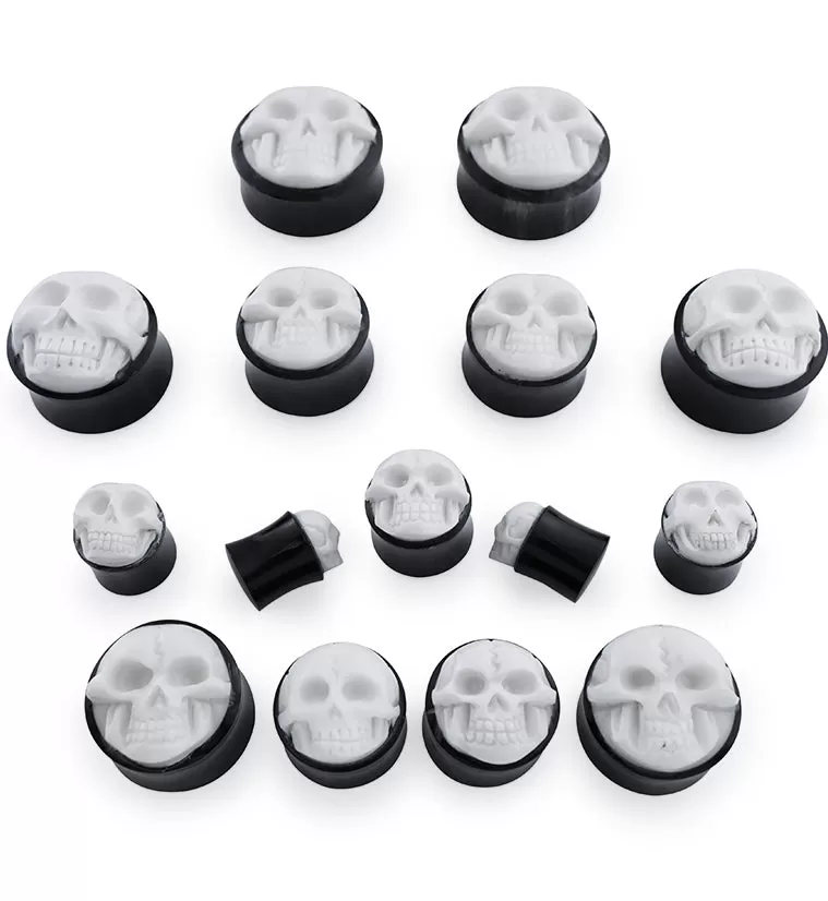 Horn Plugs With Carved Bone Skull Inlay